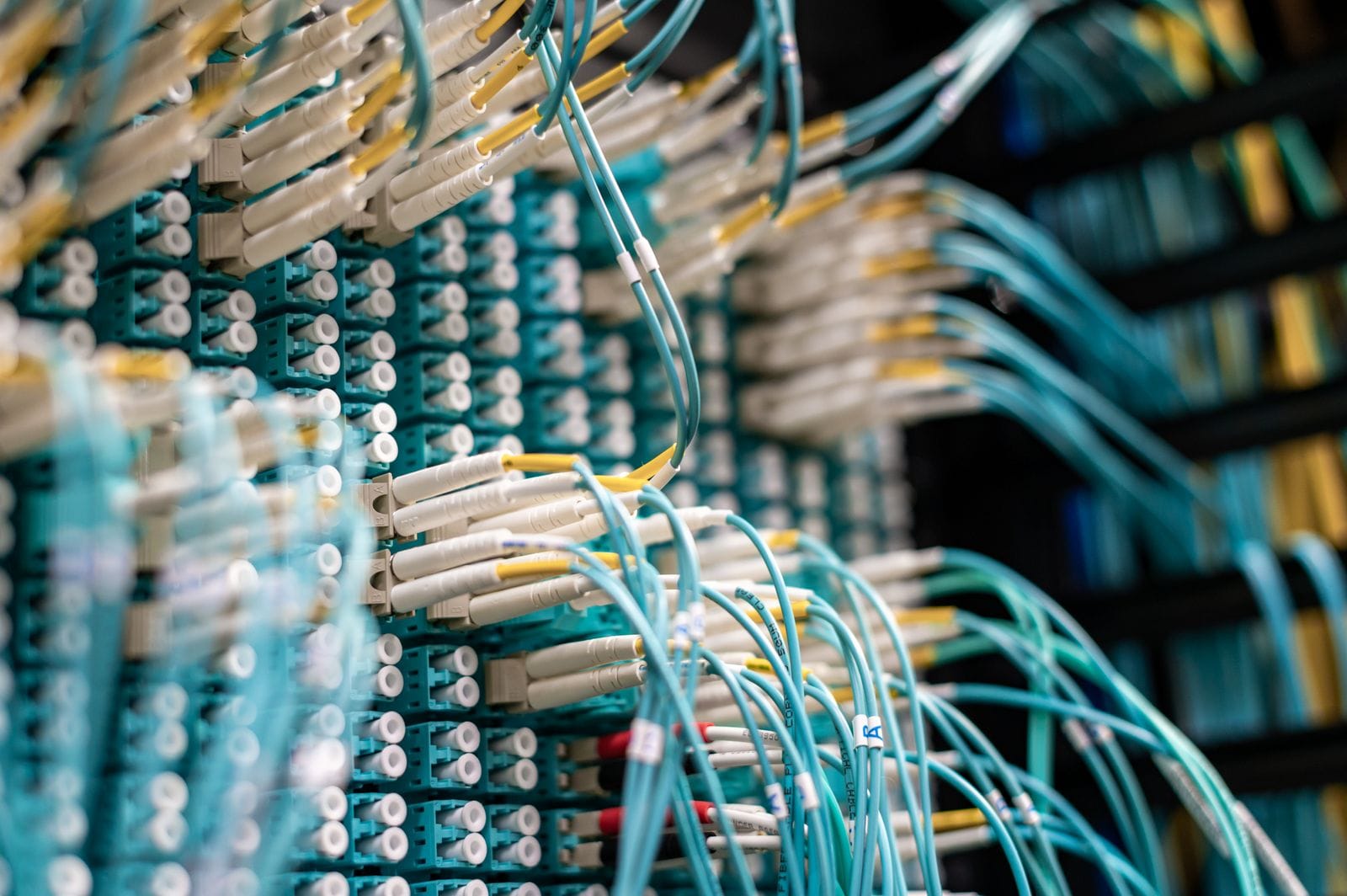 Structured fibre and copper cabling terminated in a patch panel