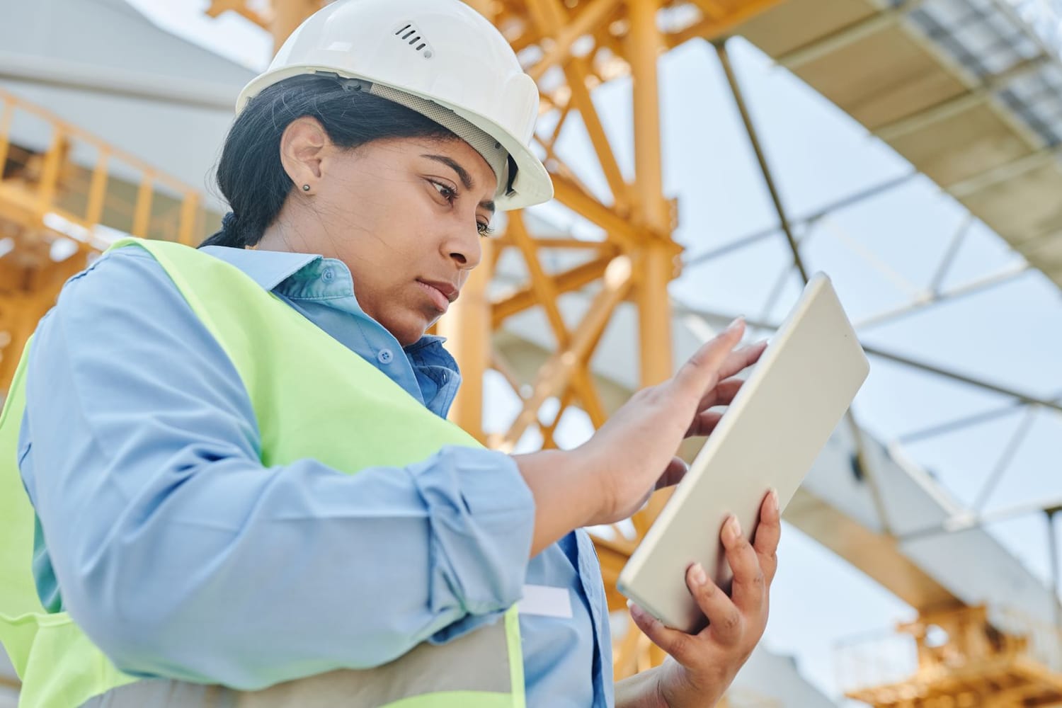 Engineer coordinating a multi-site rollout on site